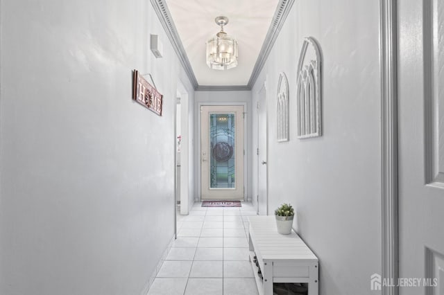 265 Plum Dr, Marlboro, NJ 07746 - doorway to outside with a chandelier, light tile patterned floors, and crown molding