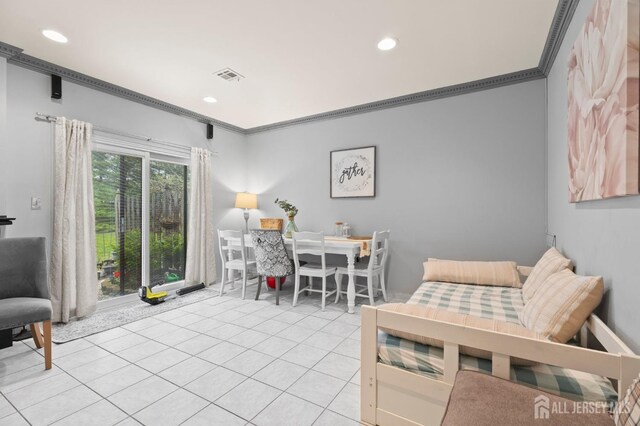 265 Plum Dr, Marlboro, NJ 07746 - sitting room featuring light tile patterned flooring, crown molding, and recessed lighting