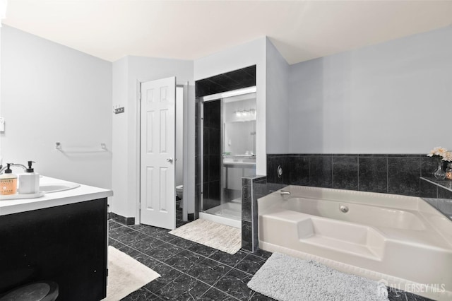 265 Plum Dr, Marlboro, NJ 07746 - bathroom featuring a garden tub, a stall shower, and vanity
