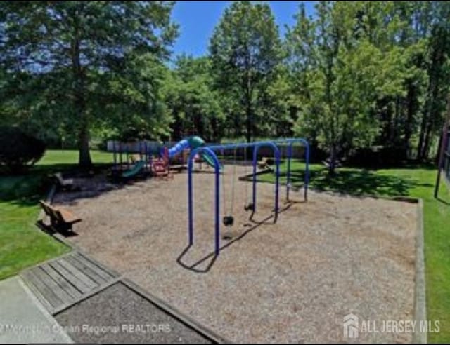 265 Plum Dr, Marlboro, NJ 07746 - view of property's community featuring a lawn