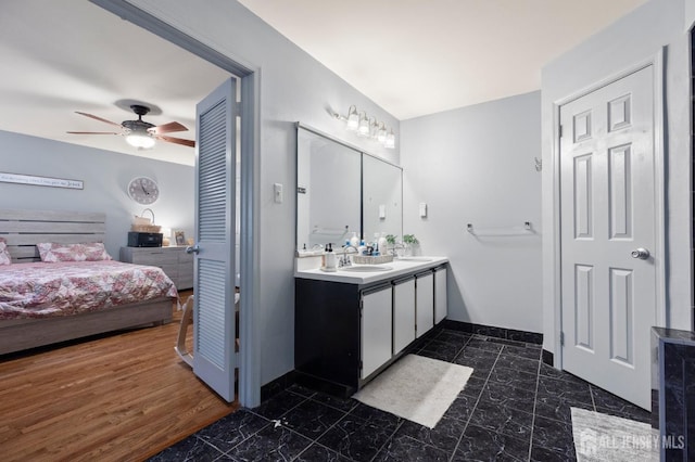 265 Plum Dr, Marlboro, NJ 07746 - ensuite bathroom with double vanity and a ceiling fan