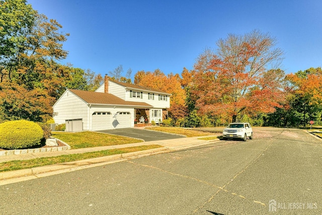 front of property featuring a garage