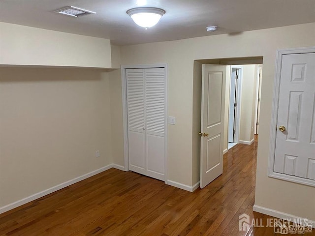 155 2nd St, South Amboy, NJ 08879 - unfurnished bedroom with wood finished floors and a closet