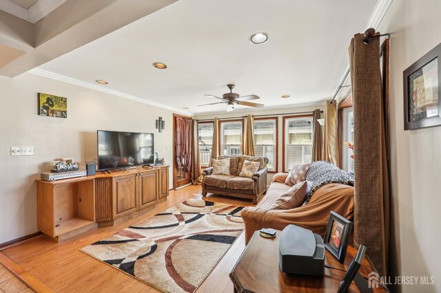 6 Claremont Ave, Colonia, NJ 07067 - living area featuring light wood-type flooring, ornamental molding, ceiling fan, recessed lighting, and baseboards