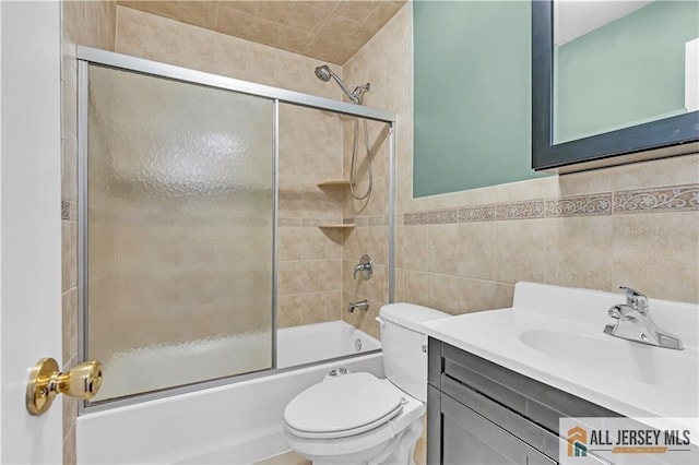 2507 Balmoral Ct, Hillsborough, NJ 08844 - full bath with enclosed tub / shower combo, vanity, and tile walls