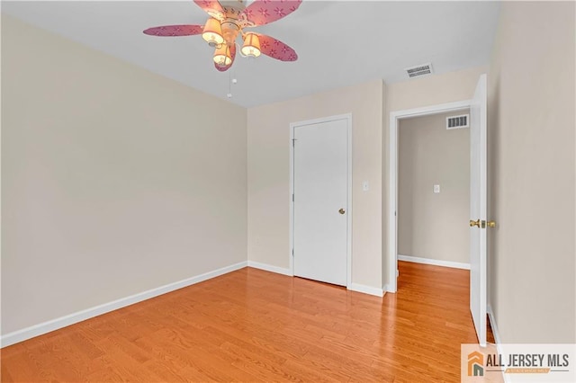 2507 Balmoral Ct, Hillsborough, NJ 08844 - unfurnished bedroom featuring wood finished floors and a ceiling fan