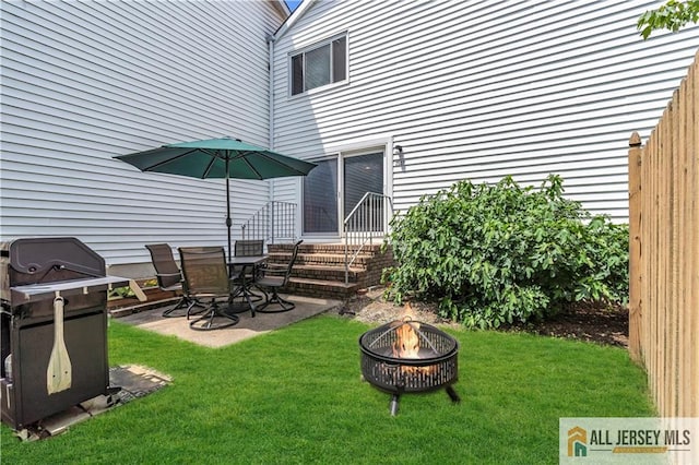 2507 Balmoral Ct, Hillsborough, NJ 08844 - view of grassy yard with a fire pit and a patio