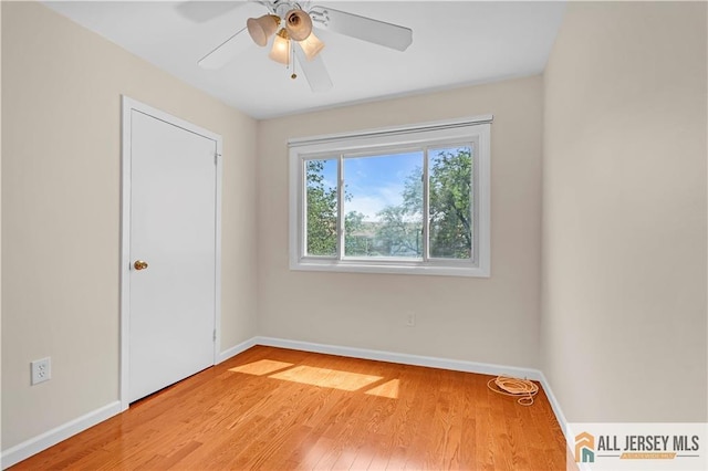 2507 Balmoral Ct, Hillsborough, NJ 08844 - empty room with wood finished floors and a ceiling fan