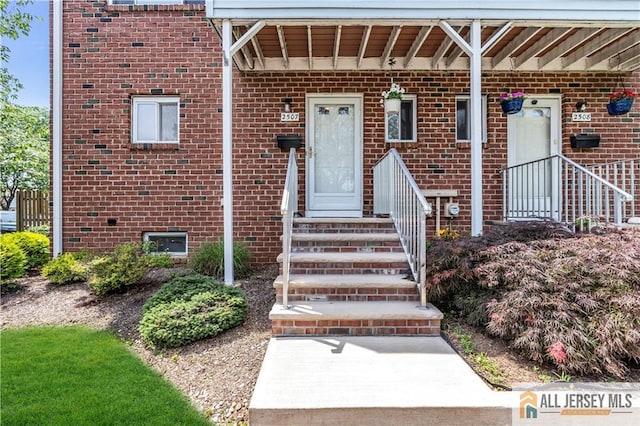 2507 Balmoral Ct, Hillsborough, NJ 08844 - doorway to property with brick siding