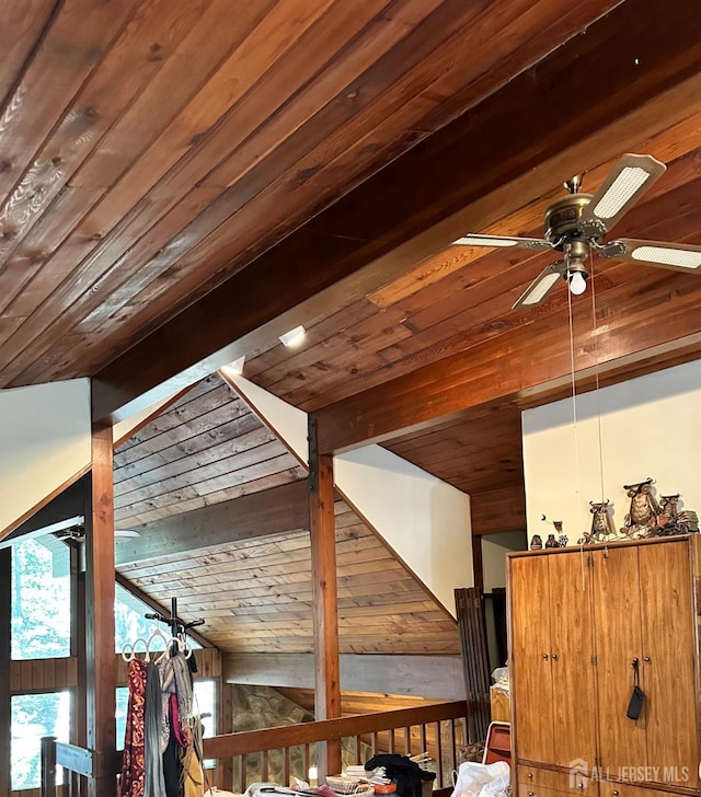 corridor featuring beamed ceiling and wooden ceiling