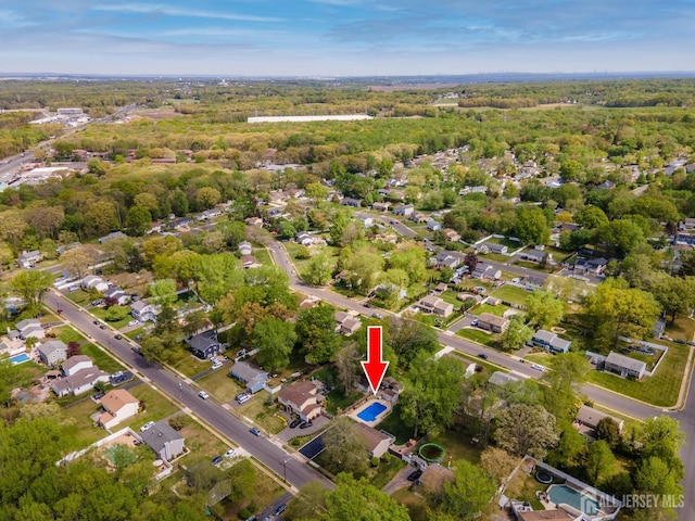 aerial view of property's location featuring nearby suburban area