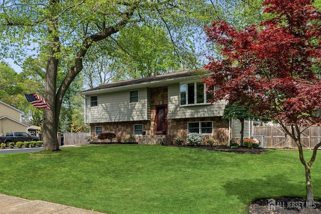 bi-level home with stone siding