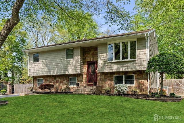 raised ranch with stone siding