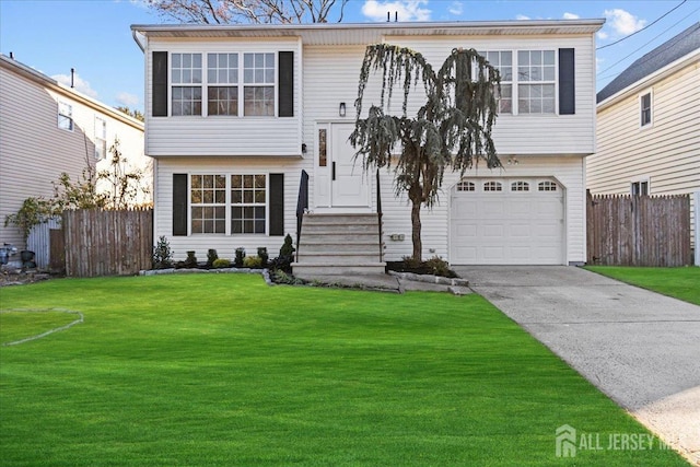 view of front of house with a front lawn and a garage