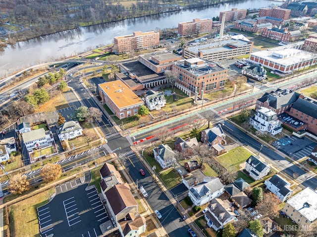 drone / aerial view with a water view