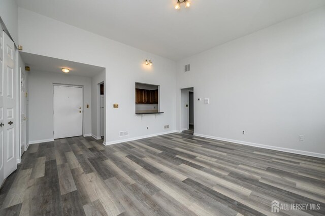 434 Lawrence St Unit 12, Perth Amboy, NJ 08861 - empty room featuring dark wood-style flooring and baseboards