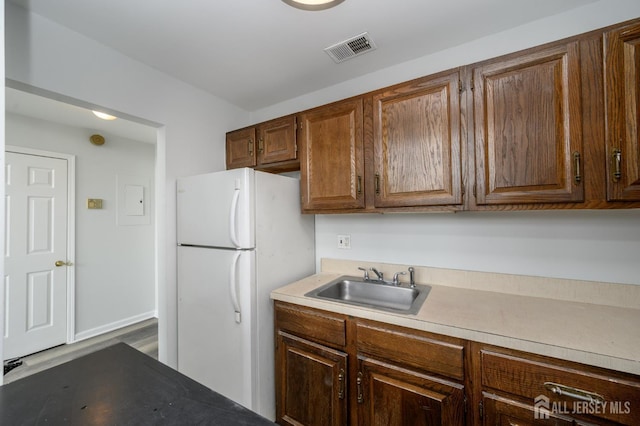 434 Lawrence St Unit 12, Perth Amboy, NJ 08861 - kitchen with freestanding refrigerator and light countertops