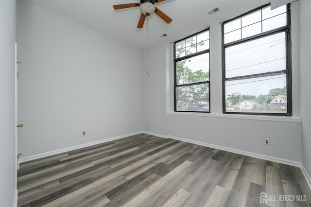 434 Lawrence St Unit 12, Perth Amboy, NJ 08861 - unfurnished room featuring a ceiling fan and wood finished floors