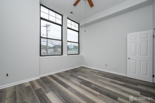 434 Lawrence St Unit 12, Perth Amboy, NJ 08861 - unfurnished room with a ceiling fan and wood finished floors