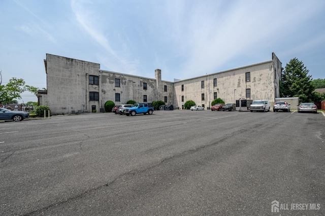 434 Lawrence St Unit 12, Perth Amboy, NJ 08861 - view of property featuring uncovered parking