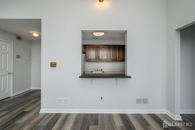 434 Lawrence St Unit 12, Perth Amboy, NJ 08861 - unfurnished dining area with dark wood finished floors and electric panel