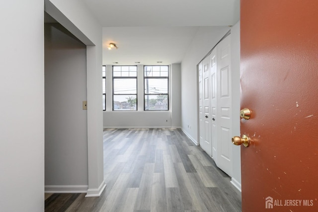 434 Lawrence St Unit 12, Perth Amboy, NJ 08861 - foyer entrance with wood finished floors and baseboards