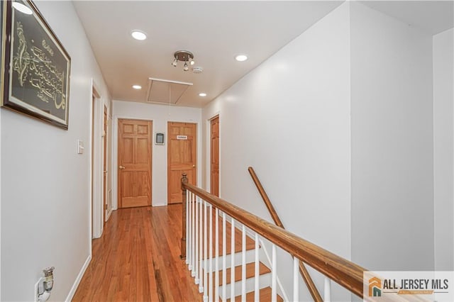 corridor featuring light hardwood / wood-style floors