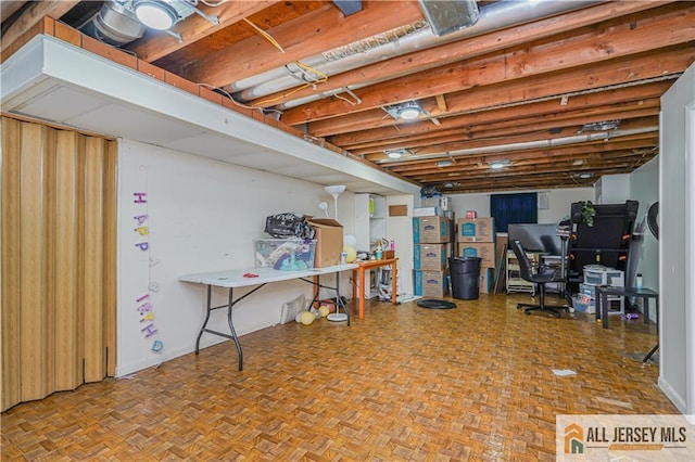 basement featuring light parquet floors