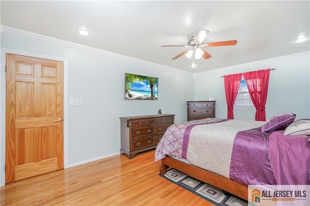 bedroom featuring ornamental molding, ceiling fan, and light hardwood / wood-style flooring