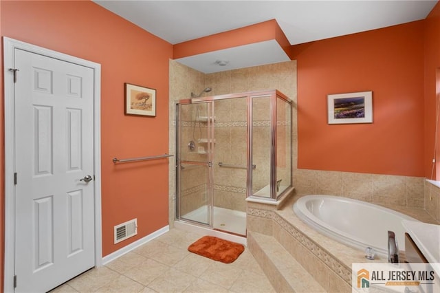 full bath with a garden tub, visible vents, a shower stall, baseboards, and tile patterned floors