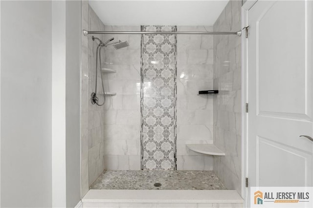 full bathroom with a stall shower