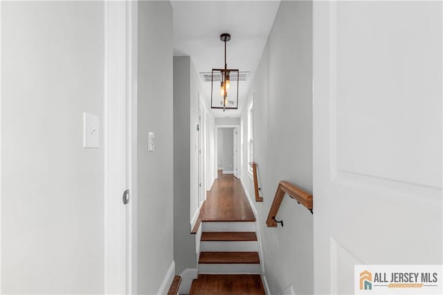 interior space featuring wood finished floors and baseboards