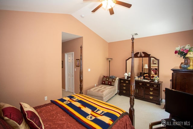 carpeted bedroom with a ceiling fan and lofted ceiling