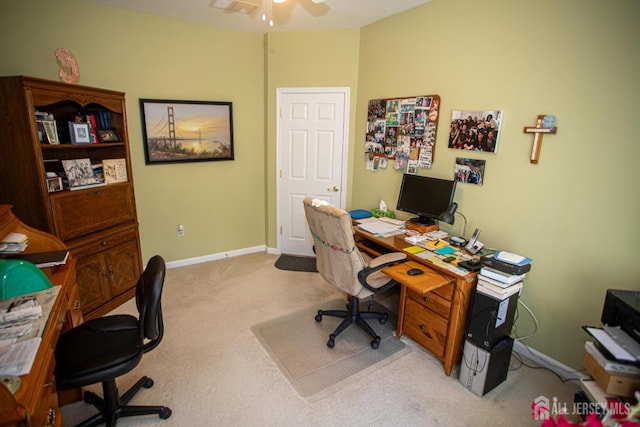 office with carpet floors, a ceiling fan, and baseboards