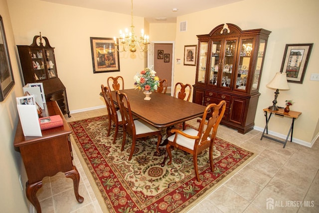 104 Prusakowski Blvd, Sayreville, NJ 08859 - dining space featuring a chandelier and light tile patterned floors