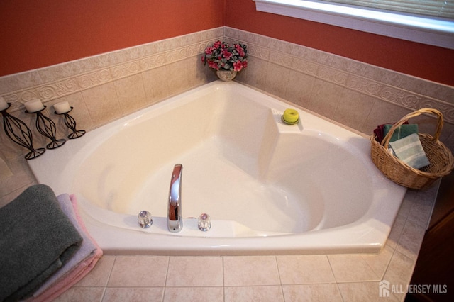 full bathroom featuring tile patterned flooring and a garden tub