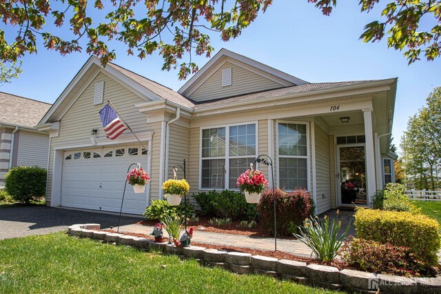 104 Prusakowski Blvd, Sayreville, NJ 08859 - ranch-style home with asphalt driveway and a garage