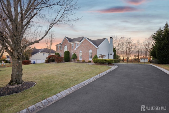 view of front of home featuring a yard