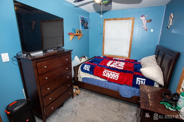 bedroom featuring carpet floors and a ceiling fan