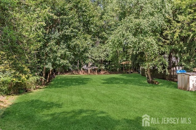 view of yard featuring fence