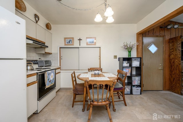 958 Apgar Ter, Rahway, NJ 07065 - dining area with a chandelier