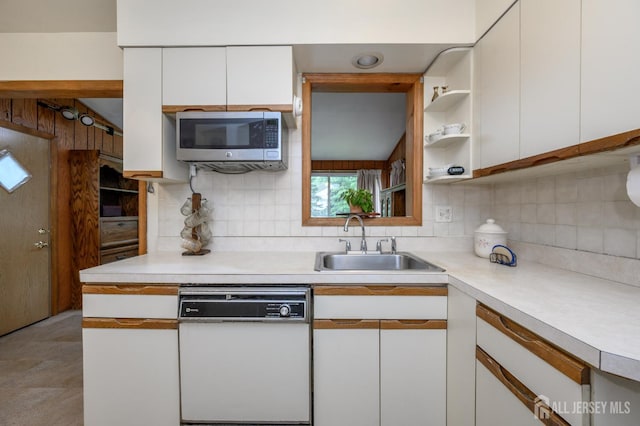 958 Apgar Ter, Rahway, NJ 07065 - kitchen with dishwasher, stainless steel microwave, white cabinetry, light countertops, and decorative backsplash