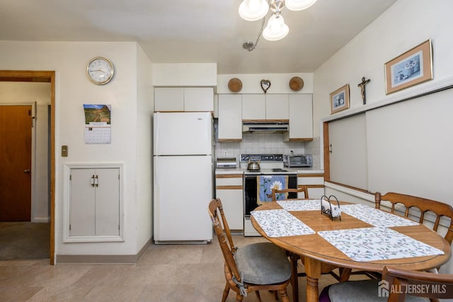 958 Apgar Ter, Rahway, NJ 07065 - dining area featuring a chandelier