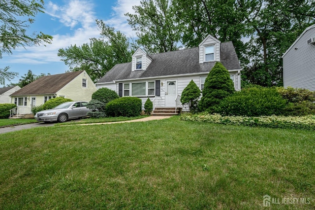 958 Apgar Ter, Rahway, NJ 07065 - new england style home featuring a front lawn, entry steps, and roof with shingles