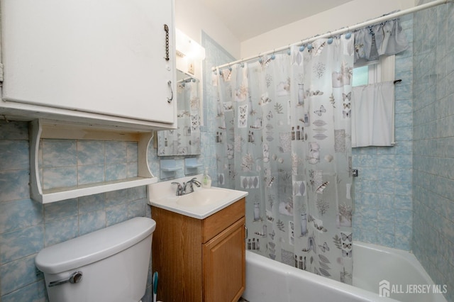 958 Apgar Ter, Rahway, NJ 07065 - full bath with vanity, shower / bath combination with curtain, decorative backsplash, and tile walls