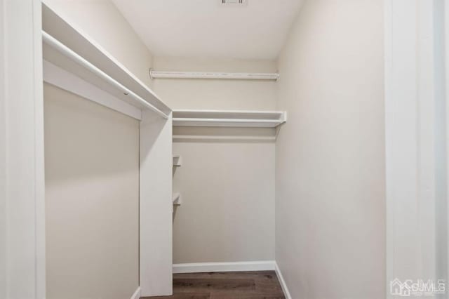 763 Prospect Ave, Old Bridge, NJ 08879 - walk in closet with wood finished floors