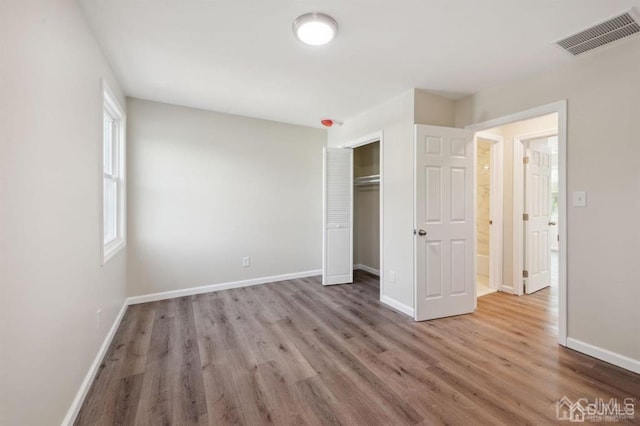 763 Prospect Ave, Old Bridge, NJ 08879 - unfurnished bedroom featuring wood finished floors and a closet
