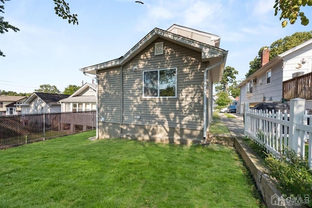 763 Prospect Ave, Old Bridge, NJ 08879 - back of property featuring a fenced backyard