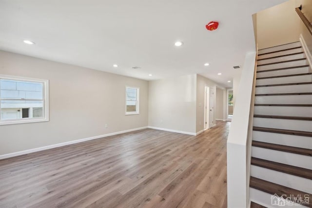 763 Prospect Ave, Old Bridge, NJ 08879 - unfurnished living room featuring stairs, light wood finished floors, and recessed lighting