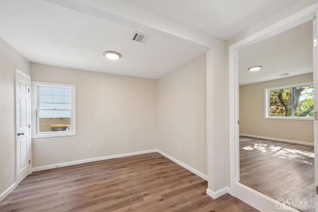 763 Prospect Ave, Old Bridge, NJ 08879 - empty room featuring wood finished floors and baseboards